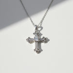 Platinum-plated silver cross necklace with 0.5ct moissanite center stone