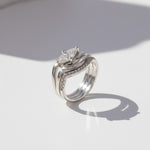 Platinum-plated sterling silver marquise 1ct moissanite ring set close-up