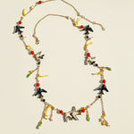 Swallow and pearl necklace with red beads and gold-plated accents.