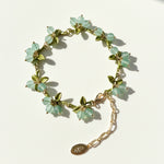 Mint green berry garden bracelet with semi-precious stone beads and enamel leaf details on gold-plated brass