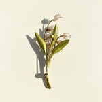 Back view of lily of the valley brooch with metal pin fastening