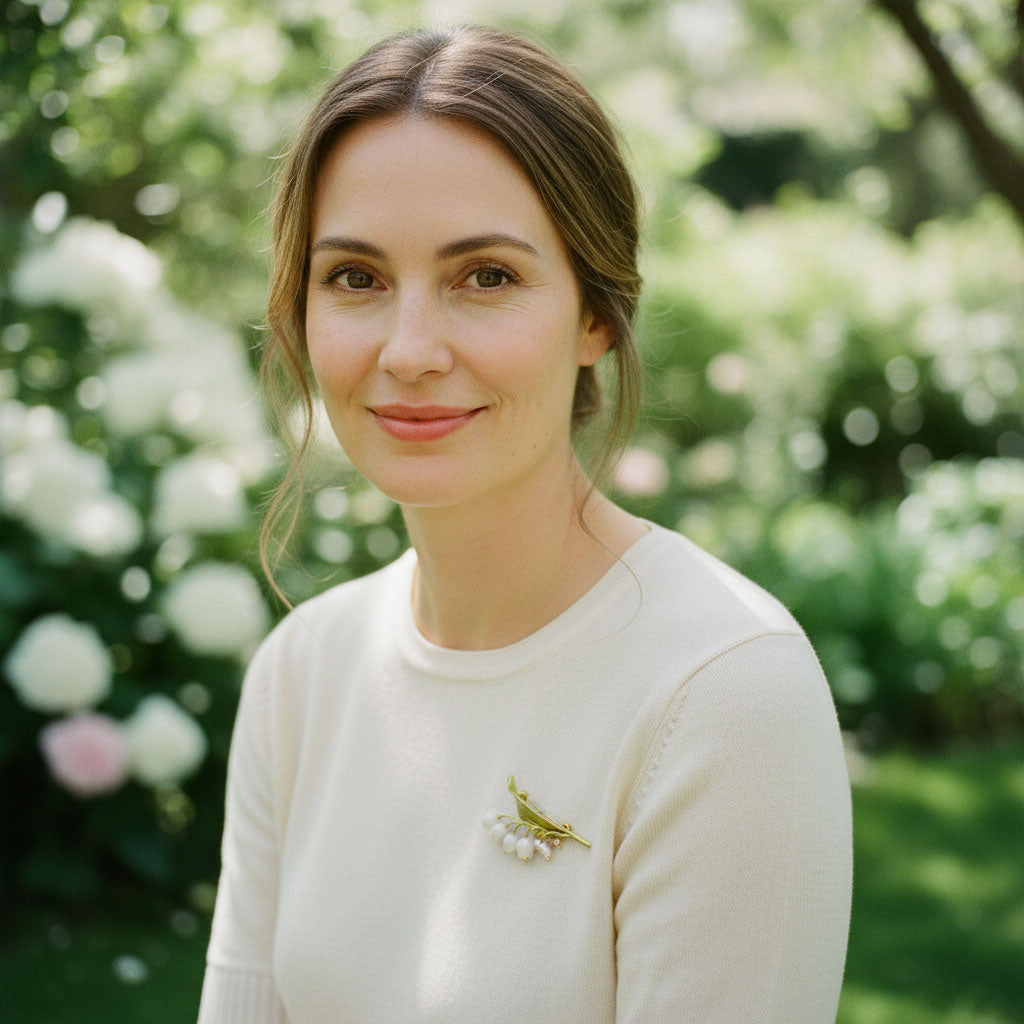 Botanical lily of the valley brooch worn on knitwear