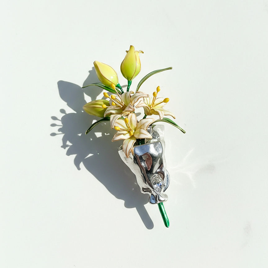 Hand-painted resin flower brooch with green leaves and bud details