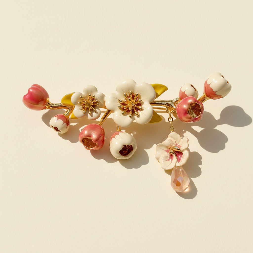 Floral brooch with pink and white flowers on a beige background