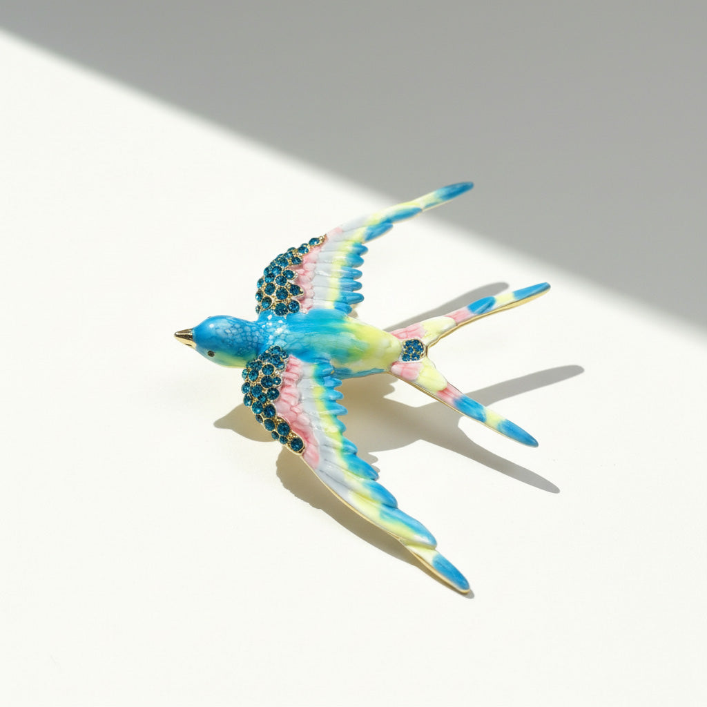 Colorful bird-shaped hair clip on a light gray background