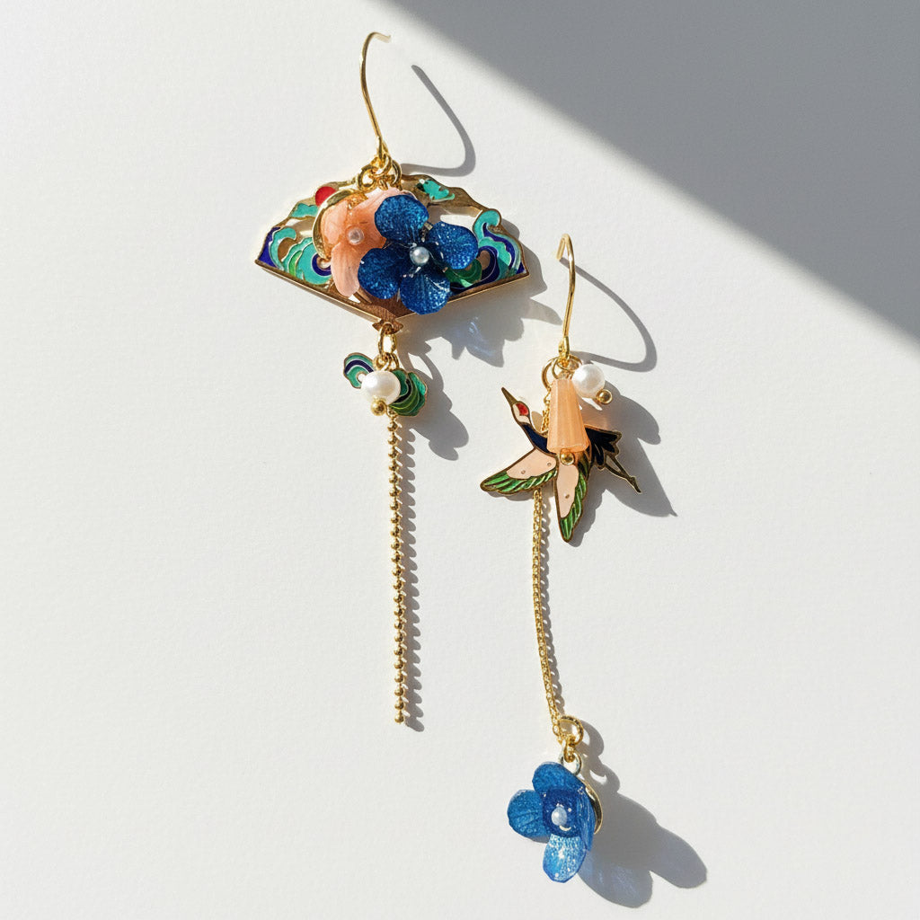 Gold plated hydrangea fan and crane drop earrings with hand-painted enamel.