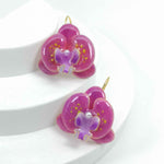Handcrafted pink orchid enamel earrings with gold hooks and pearl center