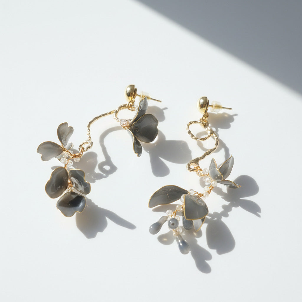 Floral earrings with gold accents on a light background