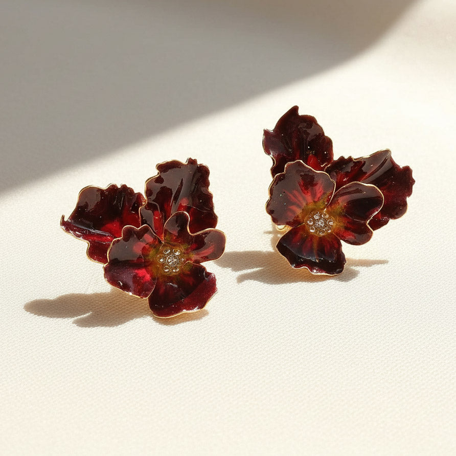 Pair of floral earrings on a light background