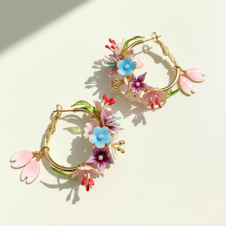 Floral hoop earrings on a light background