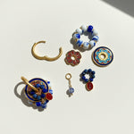 Collection of colorful jewelry pieces on a light background