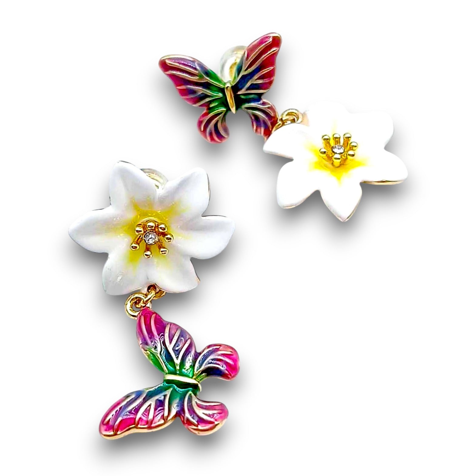 Colorful butterfly earrings with white flowers on a white background