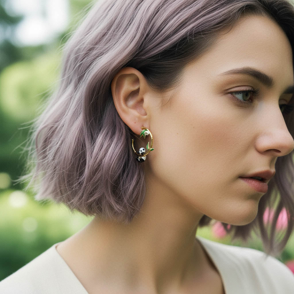 Close-up of a woman with purple hair wearing an earring outdoors
