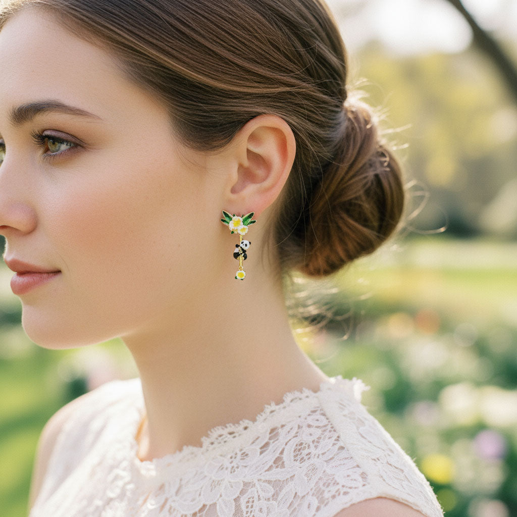 Woman wearing a floral earring with a blurred outdoor background