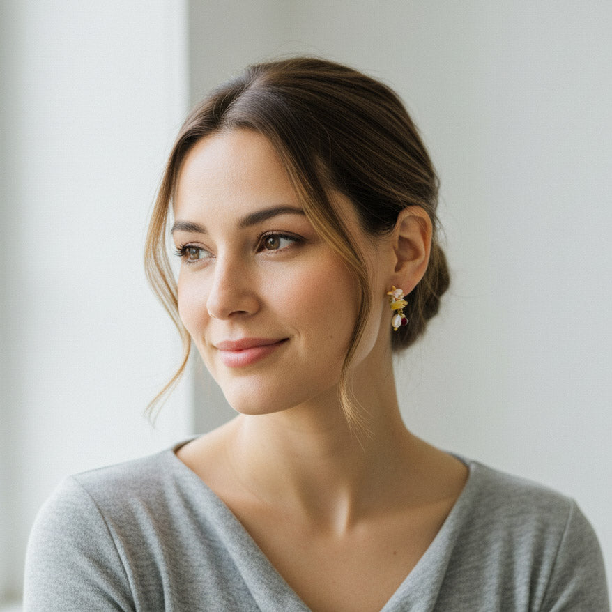 Woman wearing a gray sweater with a neutral background