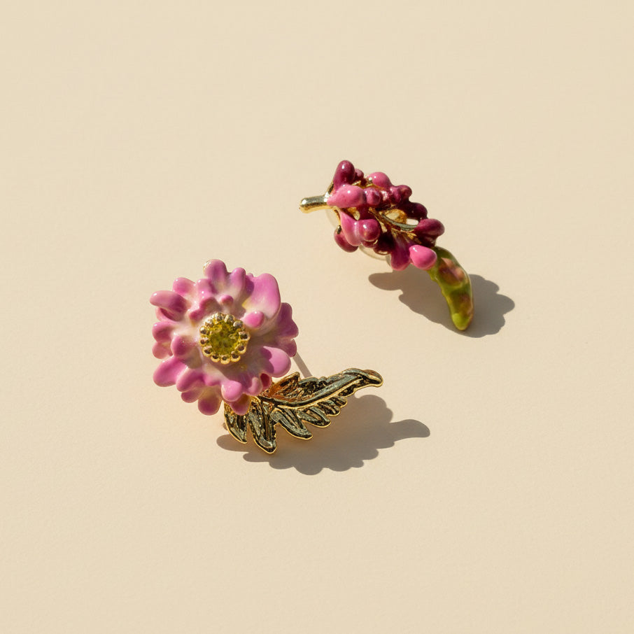 Pair of floral earrings on a beige background
