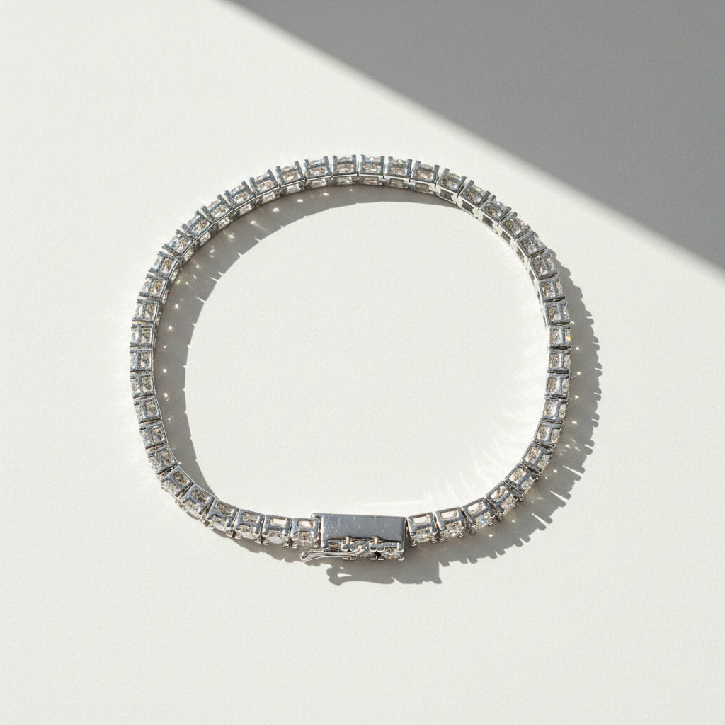 Top-down sunlight shot of platinum moissanite tennis bracelet