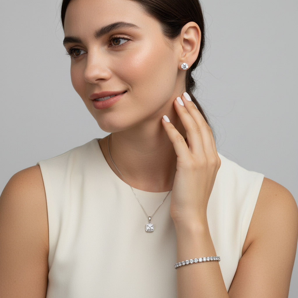 Model wearing matching moissanite jewelry set with tennis bracelet