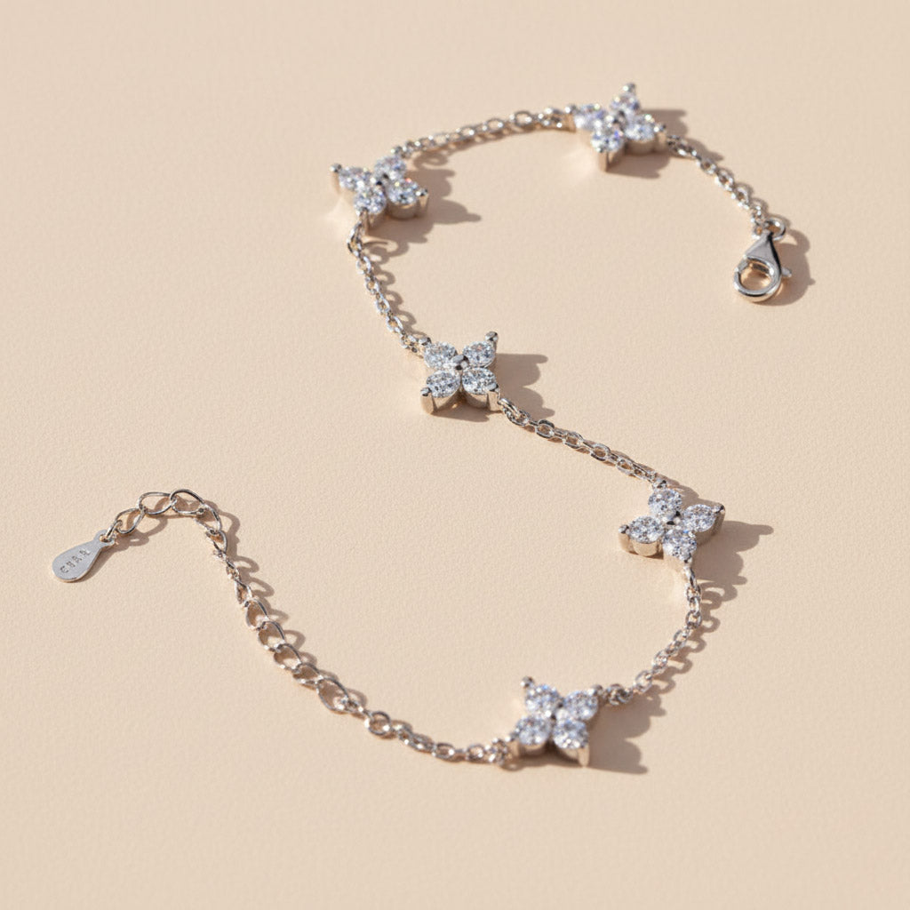 Moissanite flower chain bracelet in platinum-plated sterling silver