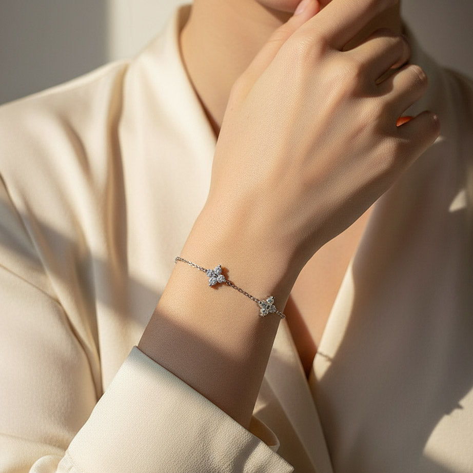 Moissanite flower bracelet worn on wrist in natural light