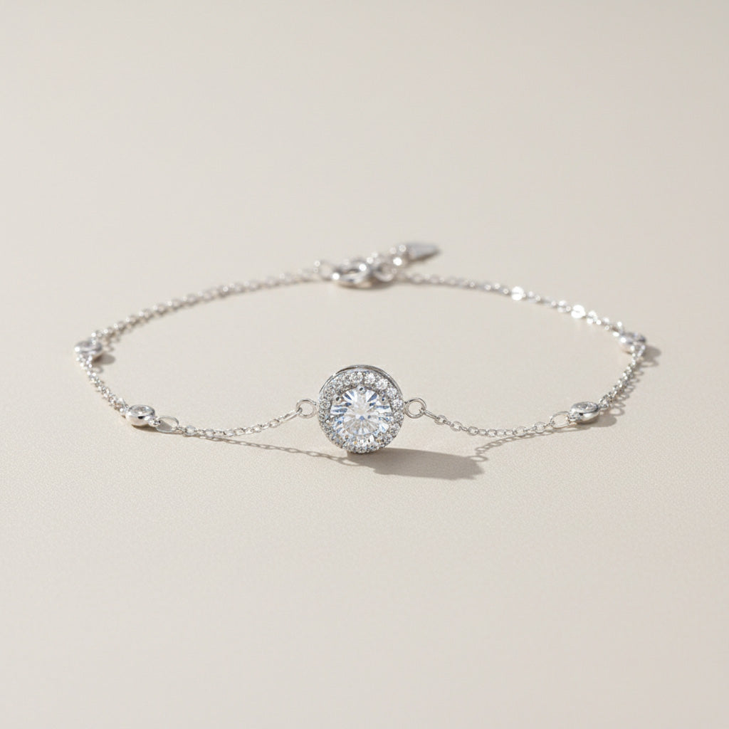 moissanite halo bracelet in platinum plated sterling silver on neutral background