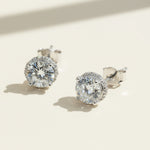 Close-up of 2ct moissanite diamond stud earrings with silver butterfly backs