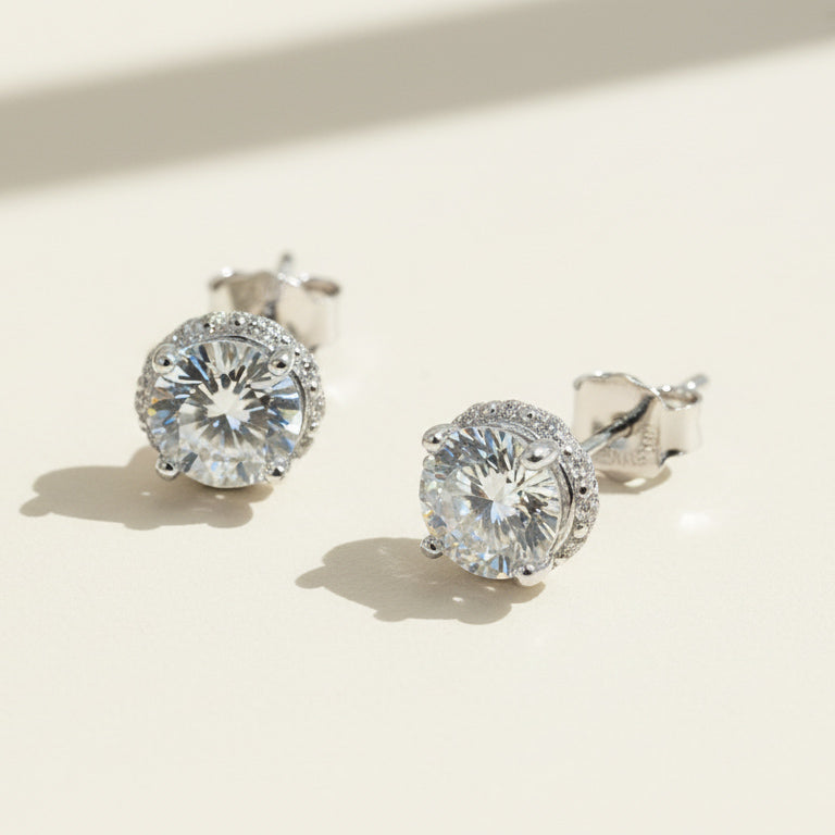 Close-up of 2ct moissanite diamond stud earrings with silver butterfly backs