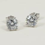 Front view of 2ct lab-grown diamond earrings, timeless solitaire design