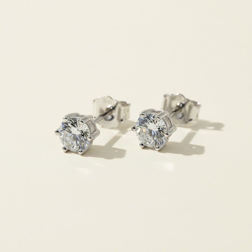 Sterling silver stud earrings with 1ct lab-grown diamonds in classic 6-prong setting