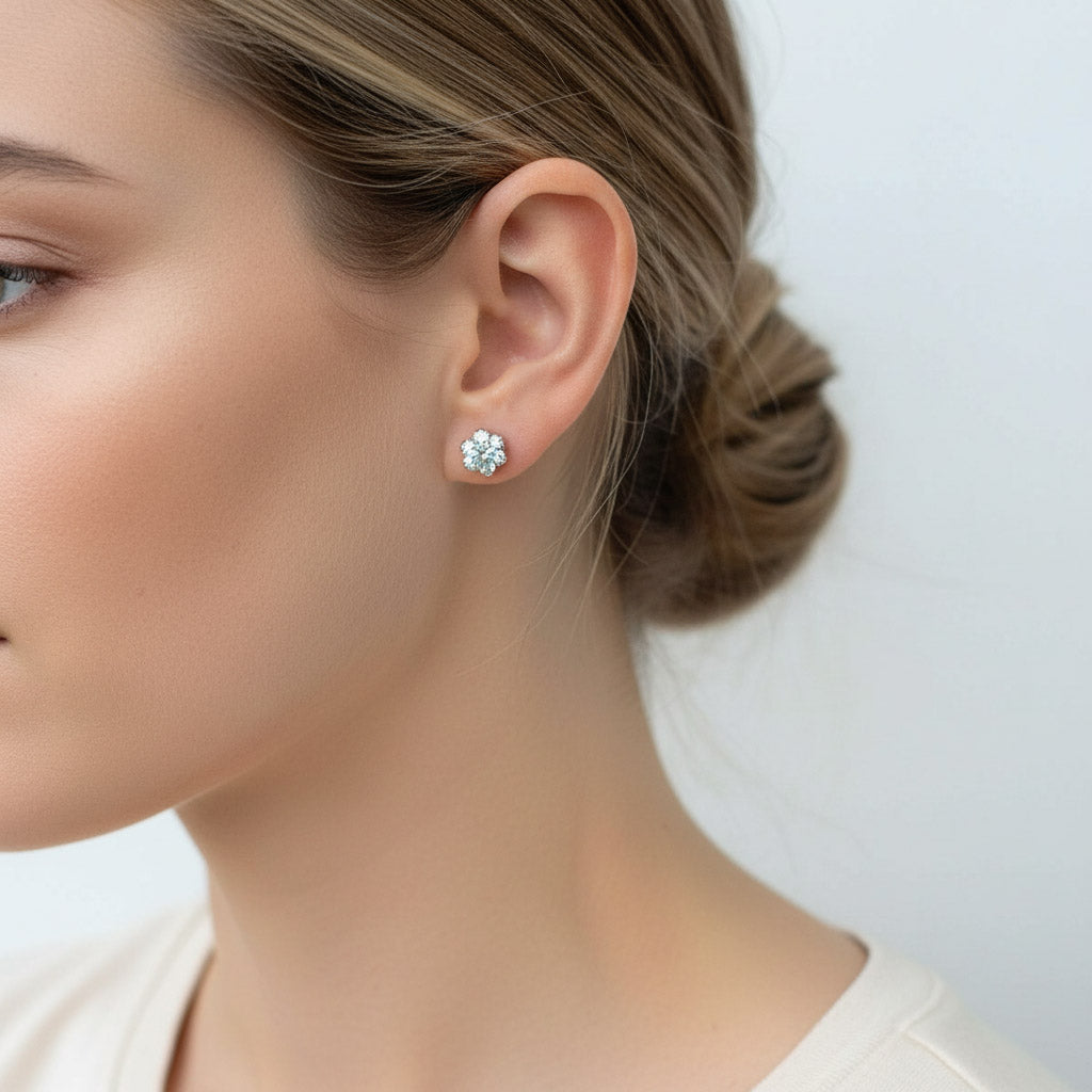 Model wearing rose gold lab-grown diamond stud earrings, 1.0ct each, D/VVS1 brilliance