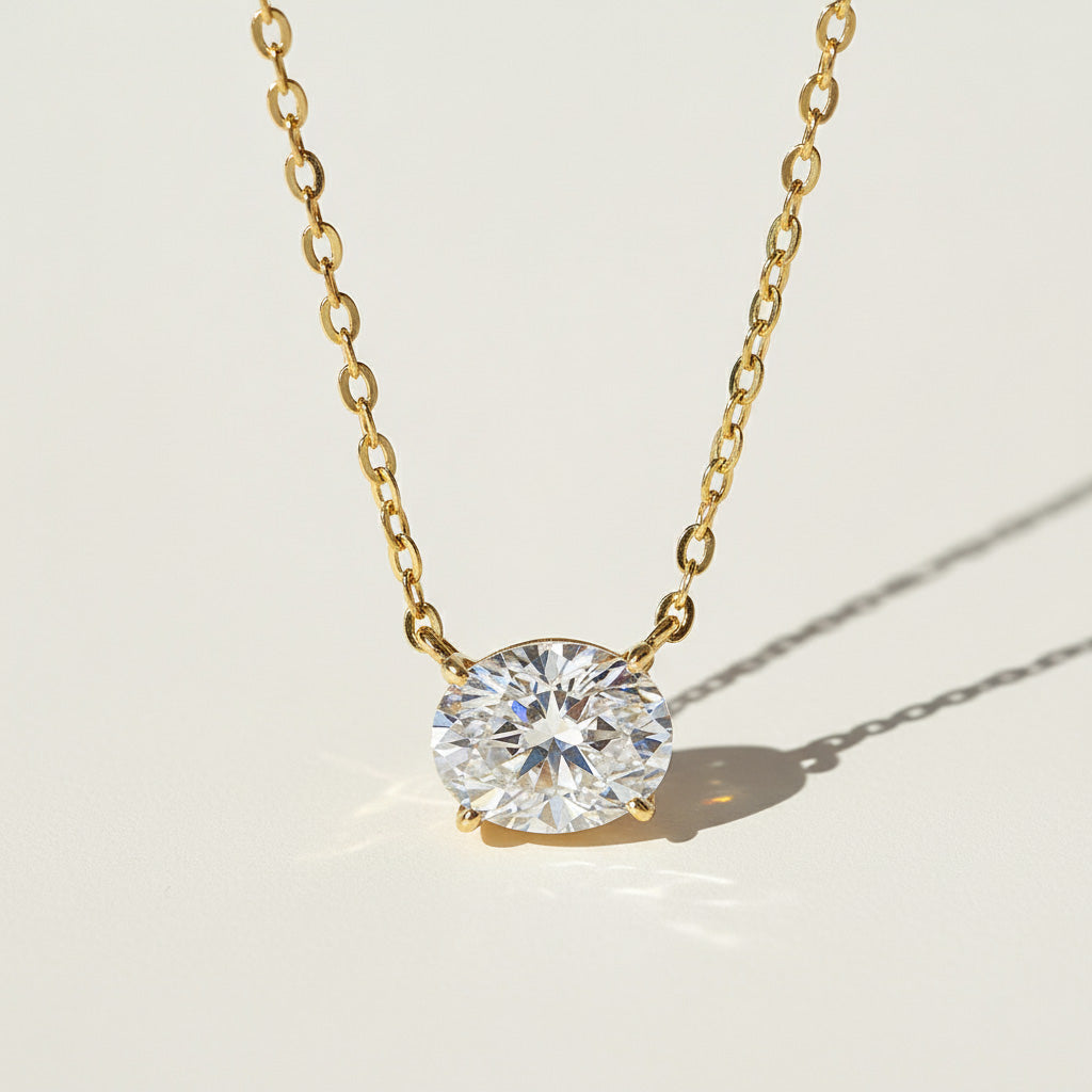 Close-up of 2ct moissanite solitaire necklace in gold setting