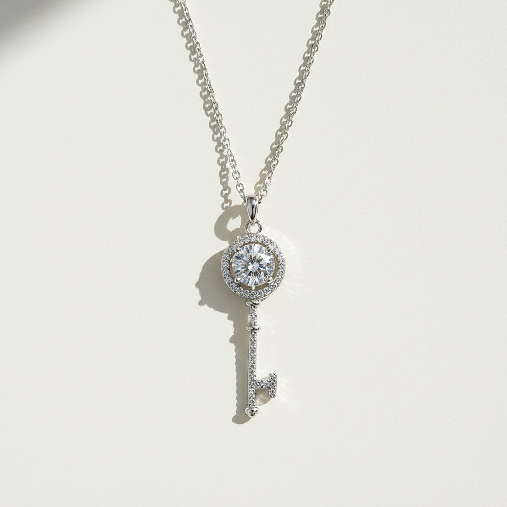 Sterling silver key necklace with 1ct moissanite center and halo details