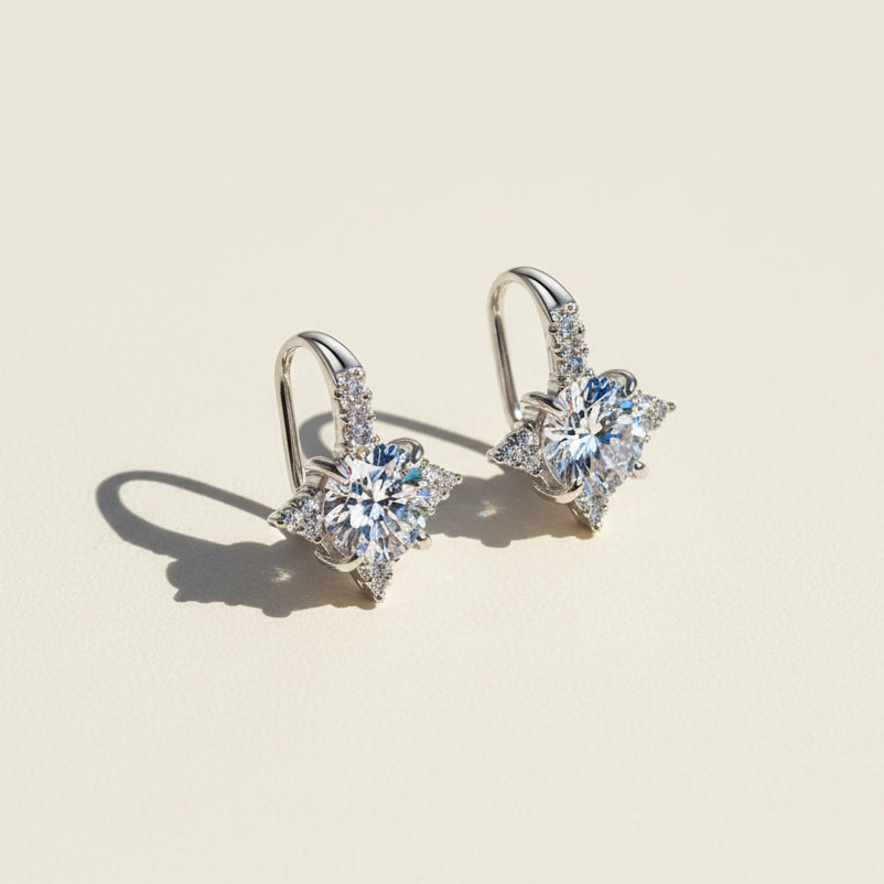 Star moissanite stud earrings in silver with round cut lab grown diamond stones
