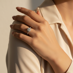 1ct moissanite halo ring worn on hand in natural daylight