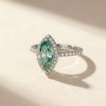 side view green marquise moissanite ring with diamond halo pavé band