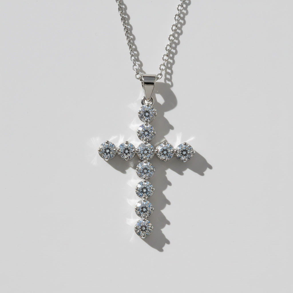 Platinum-plated silver cross necklace with 11 round VVS1 moissanite stones on a clean white background