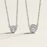 Bezel moissanite necklace in 0.5ct and 1ct size comparison, sterling silver.