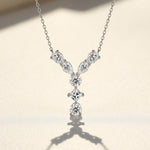 Diamond necklace with a 'Y' design on a light background