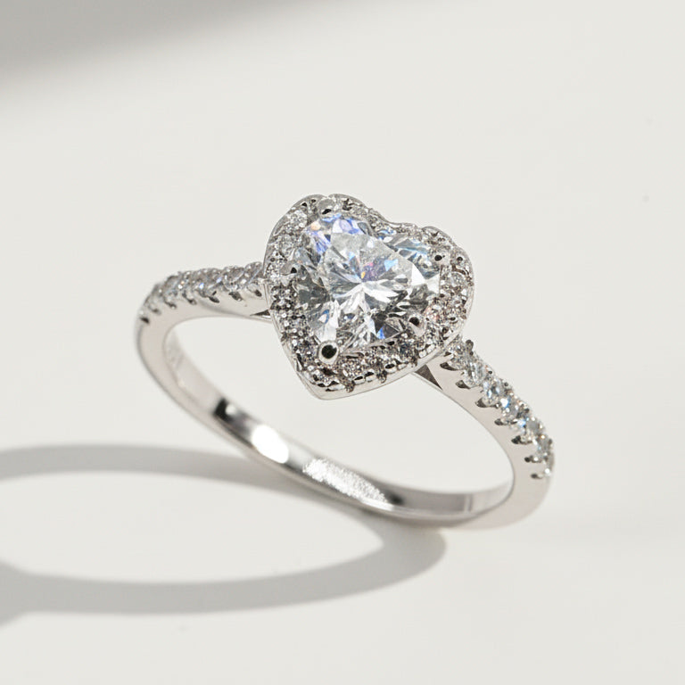 “Heart-shaped lab-grown diamond halo ring in platinum-plated sterling silver with pavé band