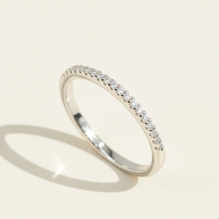 Sterling silver lab-grown diamond eternity band with round brilliant stones in pavé setting