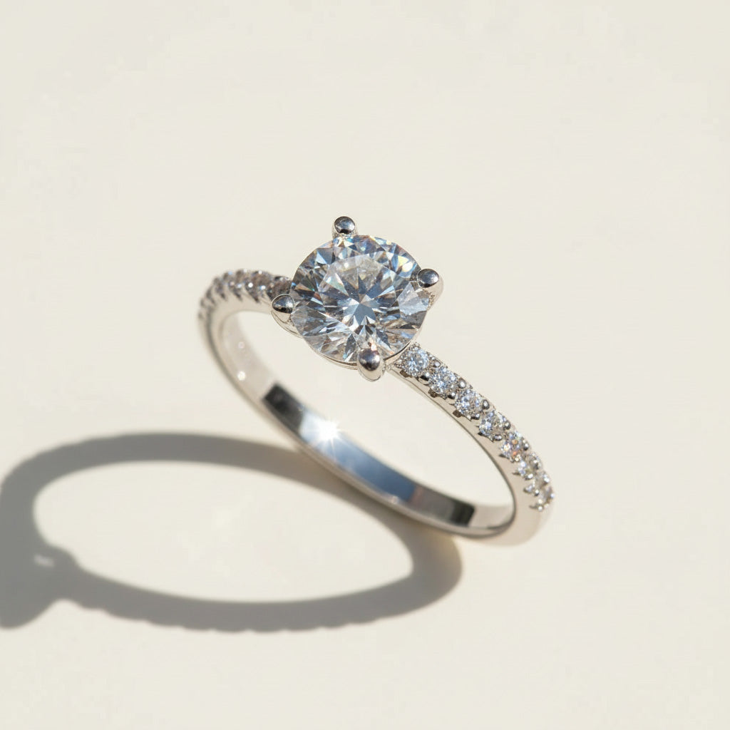 Round-cut lab-grown diamond solitaire ring in platinum-plated sterling silver setting