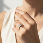 Model wearing round-cut lab-grown diamond solitaire engagement ring in sterling silver