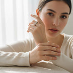 Model wearing sterling silver seven-stone lab-grown diamond ring indoors