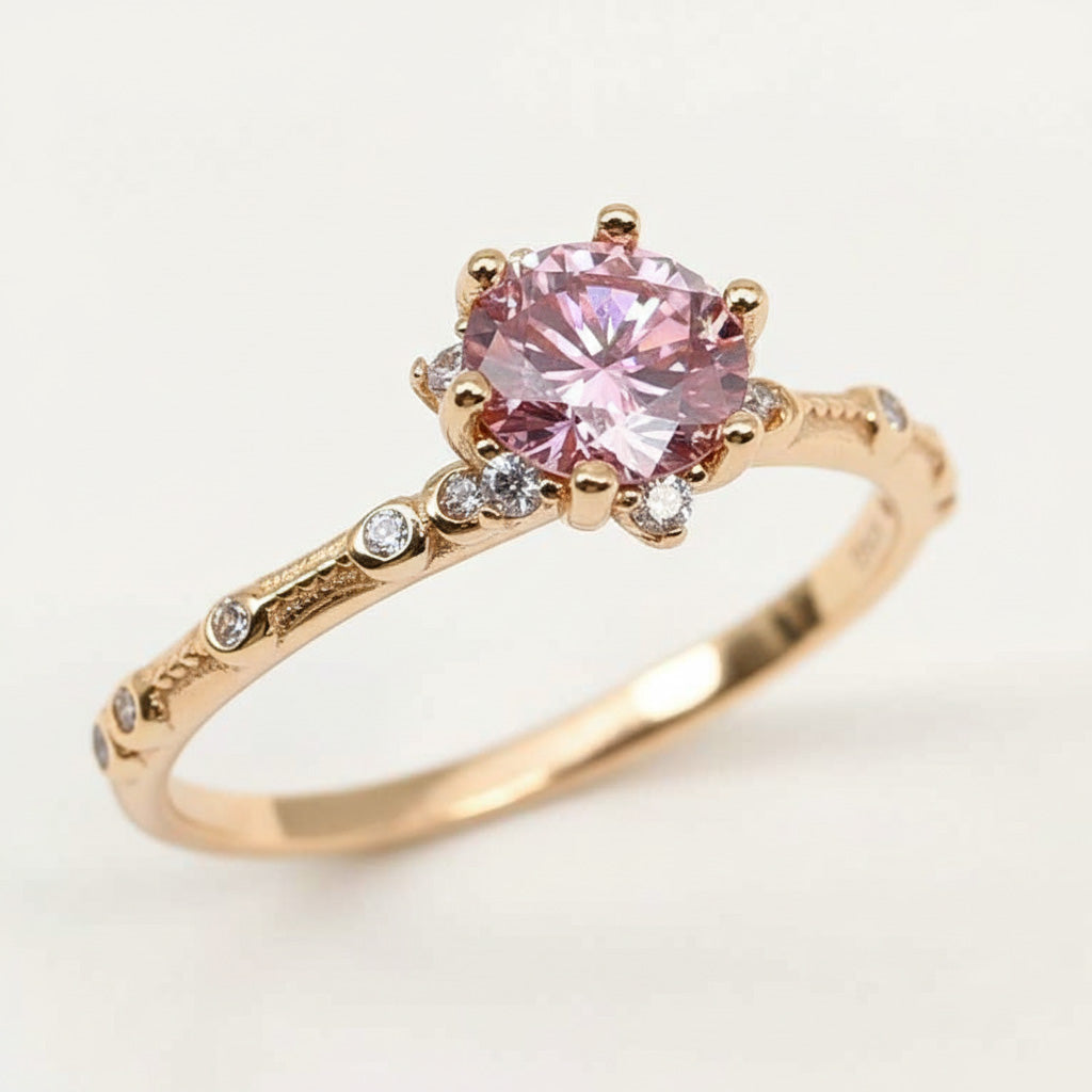 Rose gold-plated sterling silver ring featuring 1.0ct pink lab-grown moissanite and small white stones