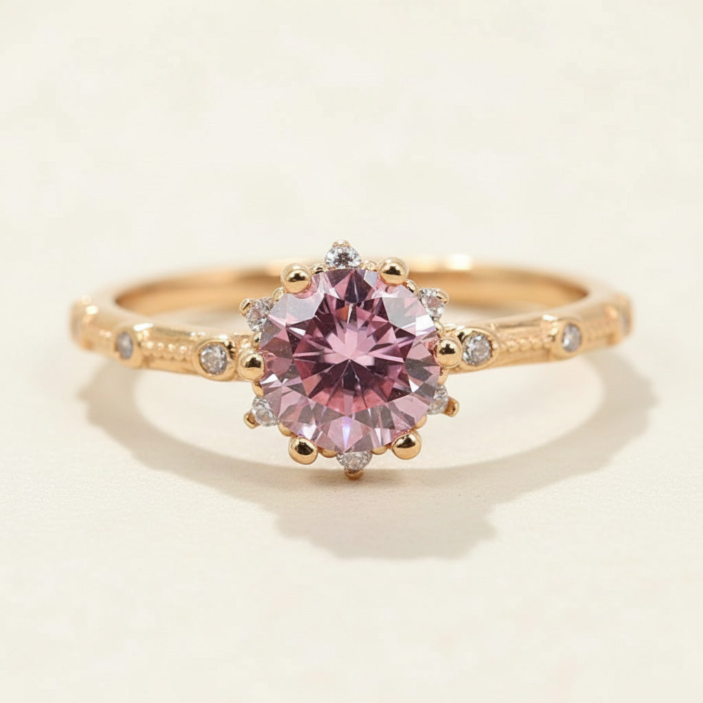 Pink lab-grown diamond ring with 1.0ct round-cut stone and side accents in rose gold-plated silver