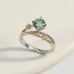 Elegant lab-grown diamond ring in mixed metal design with crossover band detail