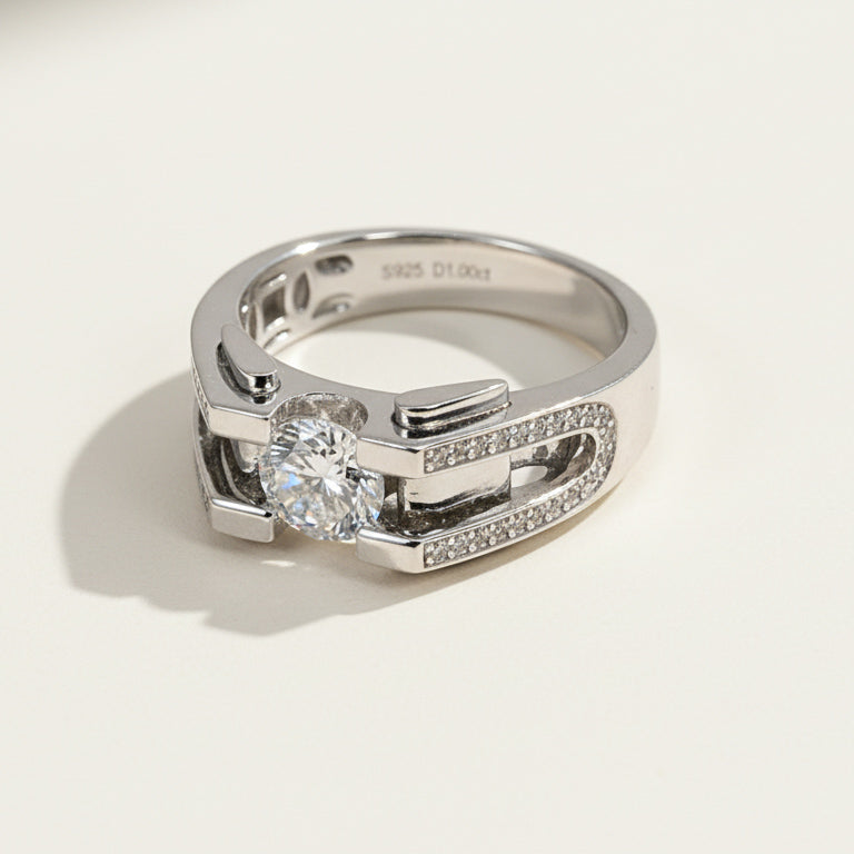 Side view of platinum-plated silver ring with round brilliant moissanite center stone