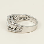 Close-up of silver moissanite ring showing detailed craftsmanship and inner hallmark”