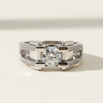 Platinum-plated silver moissanite ring with modern architectural band design