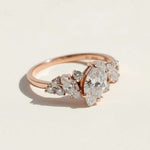 Marquise-cut lab-grown diamond engagement ring in rose gold, sparkling cluster halo design